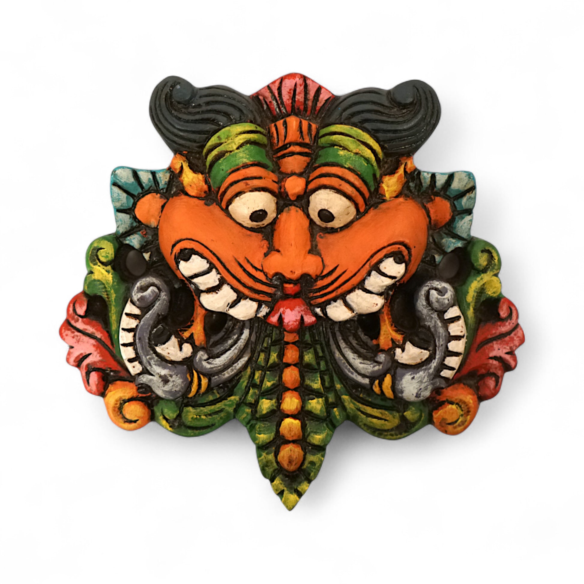 Hand-carved and hand-painted Yaali face wooden wall mount decor