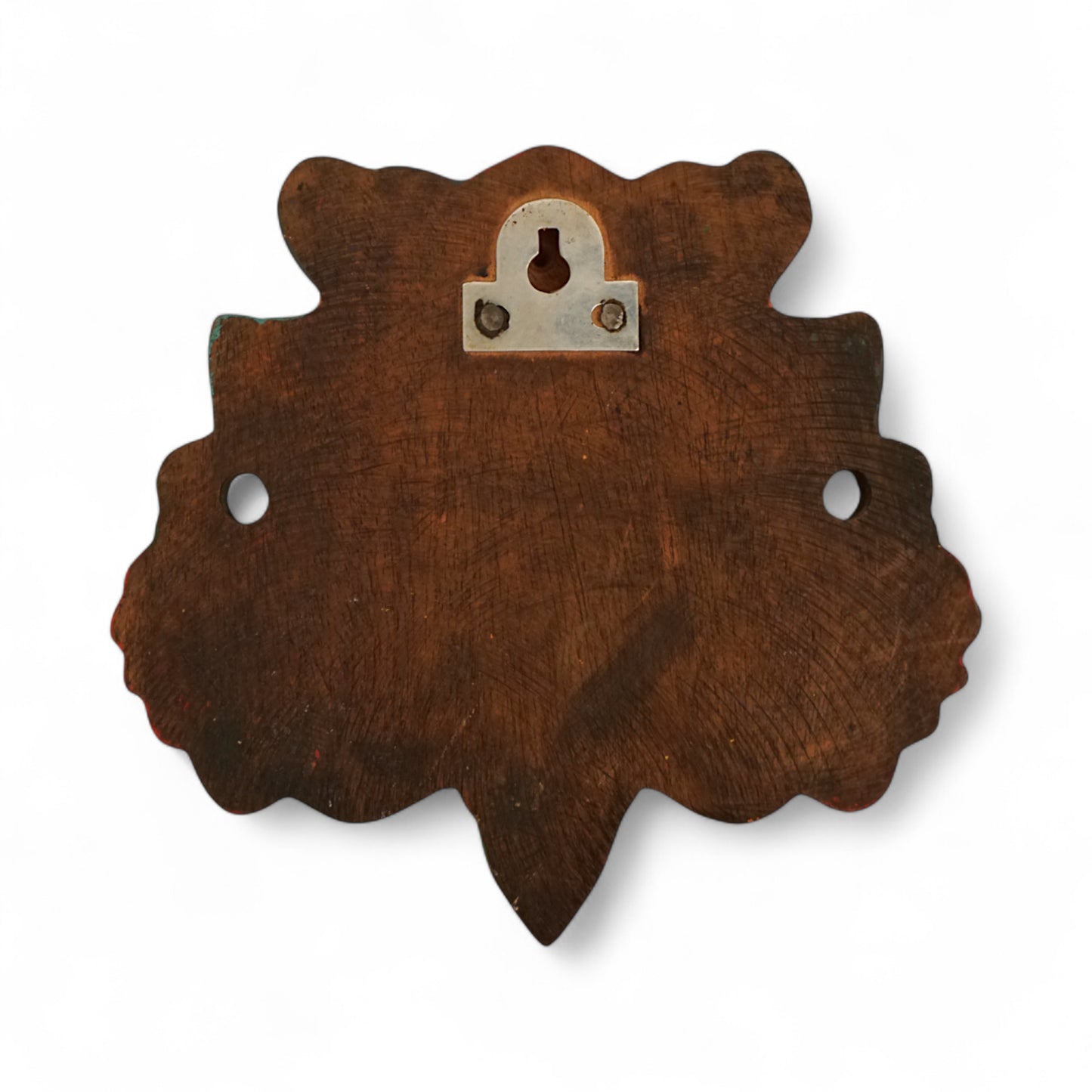 Hand-carved and hand-painted Yaali face wooden wall mount decor