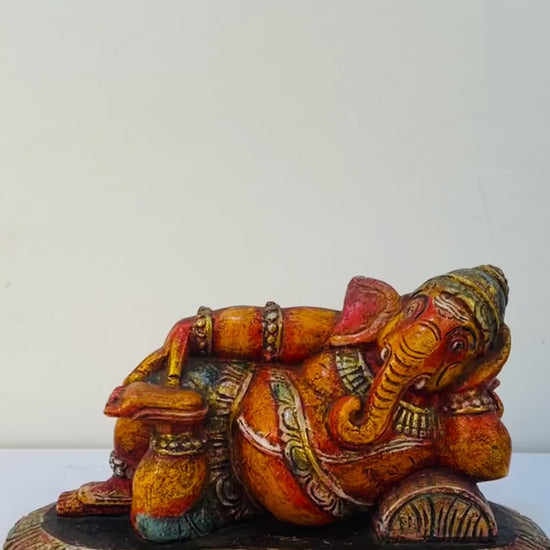 Hand-carved Relaxed Ganesha wooden sculpture for home decor