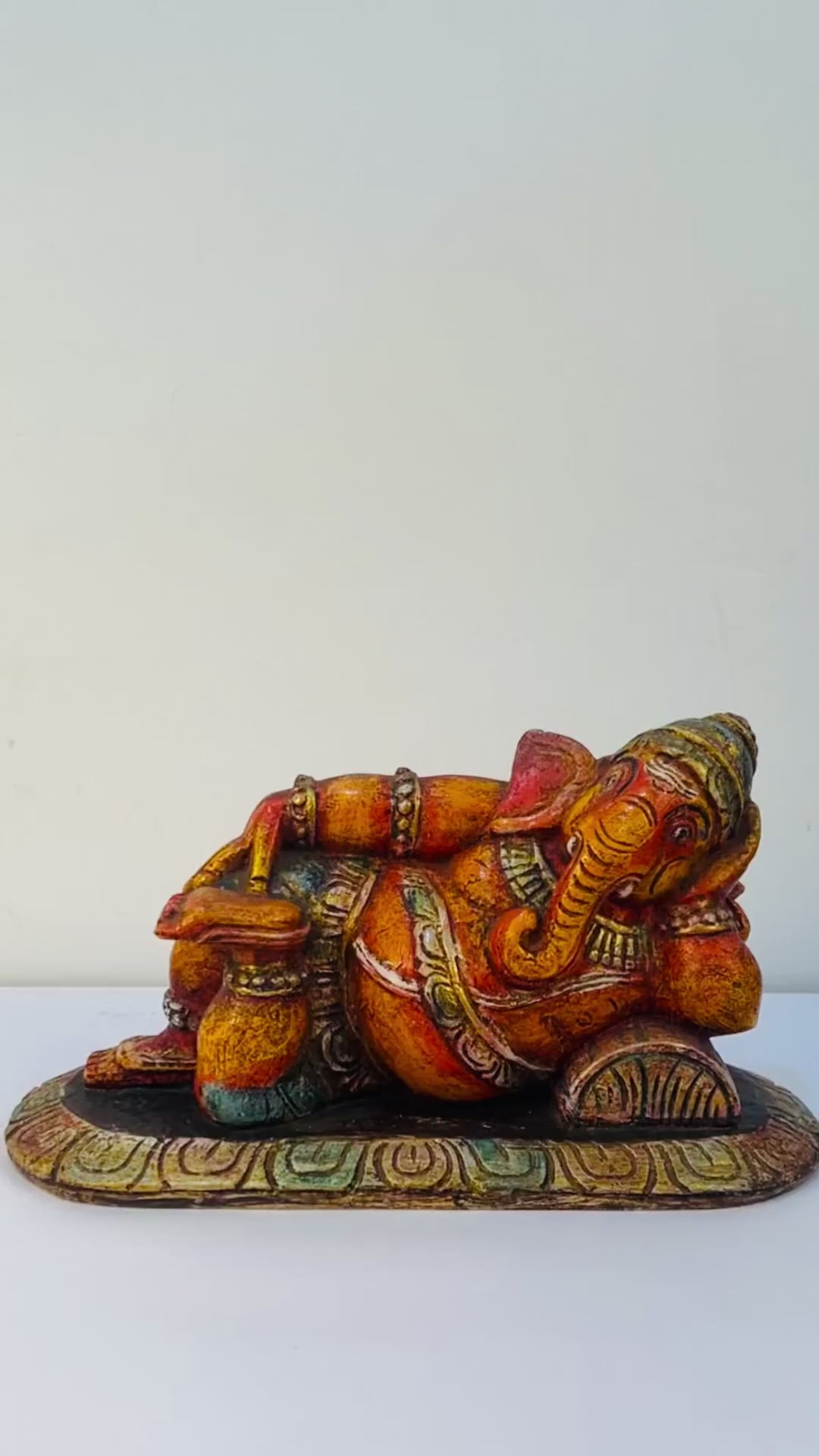 Hand-carved Relaxed Ganesha wooden sculpture for home decor