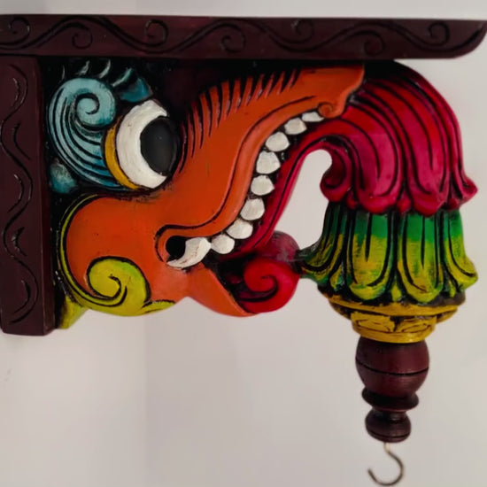 Hand-carved Yaali Vaalai wooden wall bracket