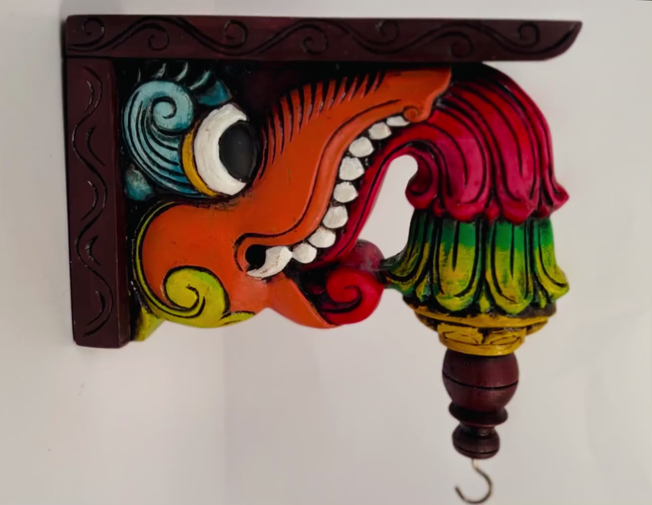 Hand-carved Yaali Vaalai wooden wall bracket